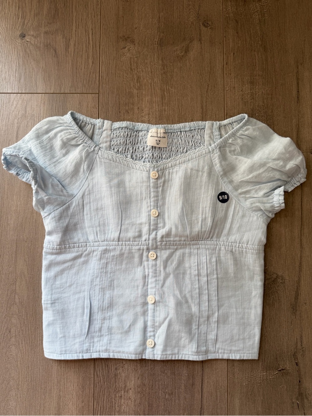 NWT Abercrombie Kids light blue cropped with back smocked tee - size 9/10